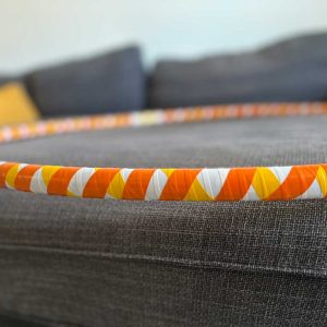 Hoop with white, orange and yellow stripes