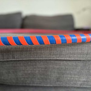 Hoop with blue base tape and bright orange reactive tape.