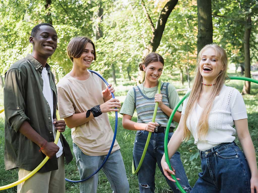 Teens Have Fun A group of teens with Hippy Hoops