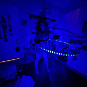 Hoop shown with neon tape under black light