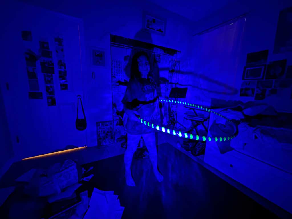 Hoop shown with neon tape under black light