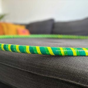Dark green base color tape, wrapped with yellow and light green reflective tape.