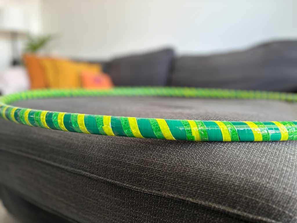 Dark green base color tape, wrapped with yellow and light green reflective tape.